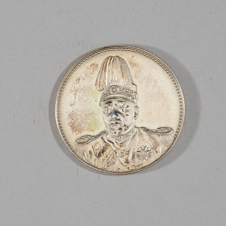 A box with five silver coins, Republic, early 20th Century.
