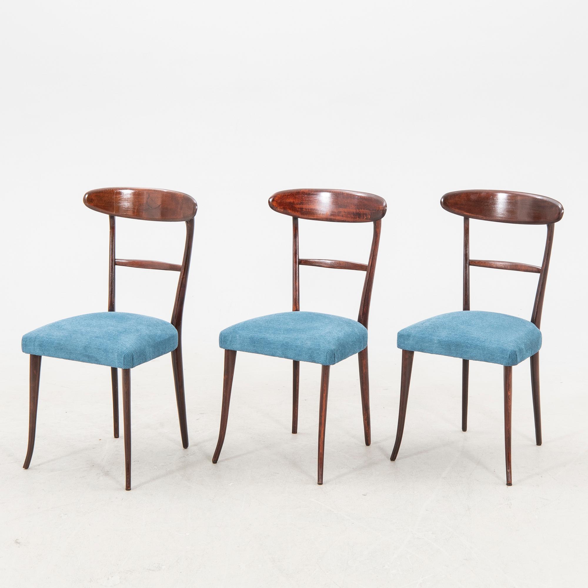 A set of six Italian Mid 1900s walnut chairs.