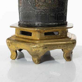 A silvered brass prayer container, Tibet, 20th century.