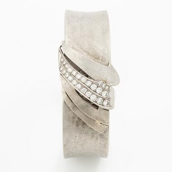 562A. Evening clock/bracelet, Bo Dolk, 18K white gold with brilliant-cut diamonds 1970s.