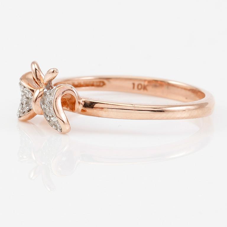 RING, 10K roséguld och diamanter tot ca 0.10 ct.