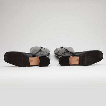 SALVATORE FERRAGAMO, a pair of black leather boots.