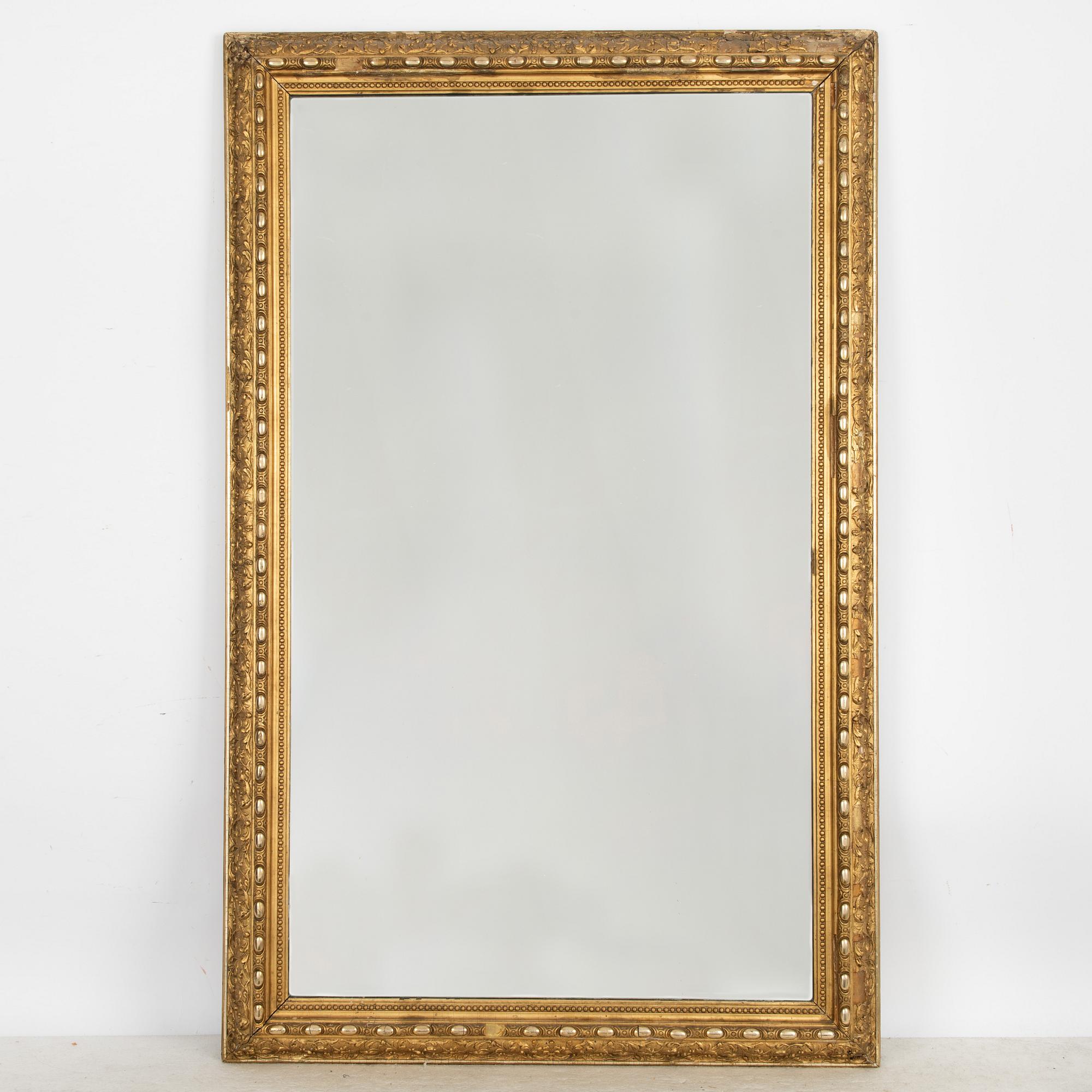 A mirror/frame, later part of the 19th century.