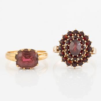 Two rings with garnets and pink tourmaline.