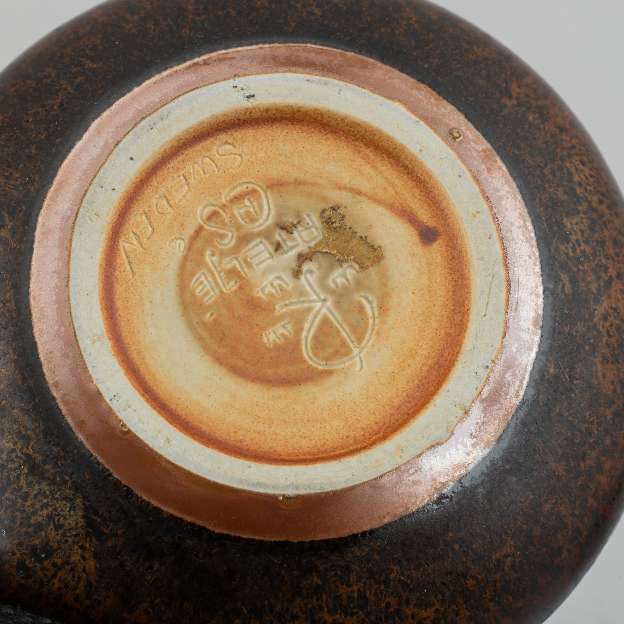 Carl-Harry Stålhane, a set of six stoneware bowls, a vase, a bottle and an ashtray, Rörstrand and Designhuset.
