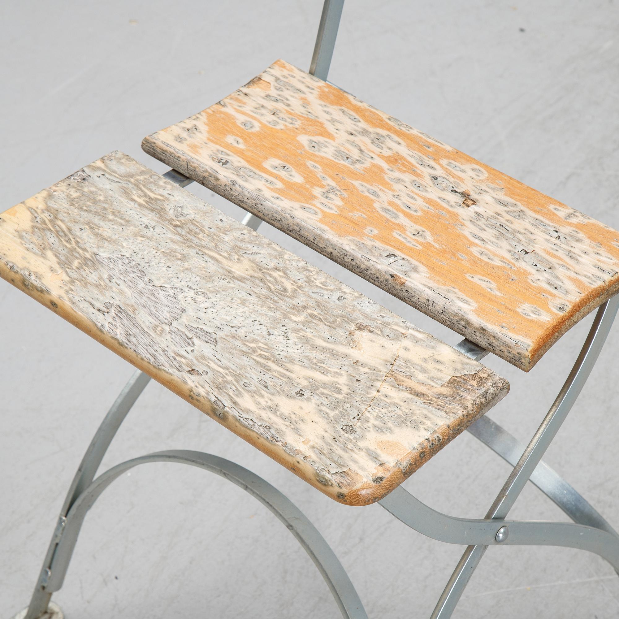 A set of four chairs and one table, Grythyttan, late 20th century.