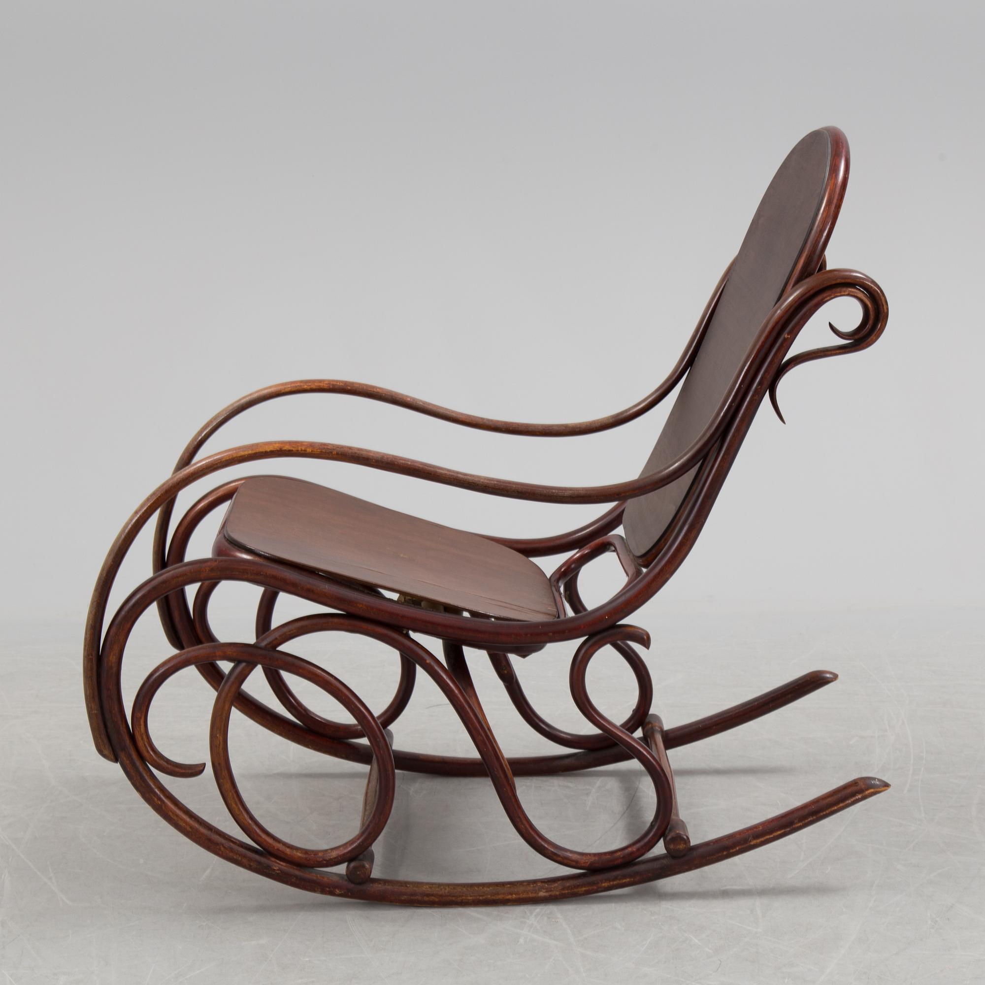 A stained rocking chair by Thonet, about 1900.
