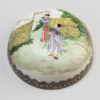 Two Chinese famille rose hat stands and a jar with cover, 20th century.