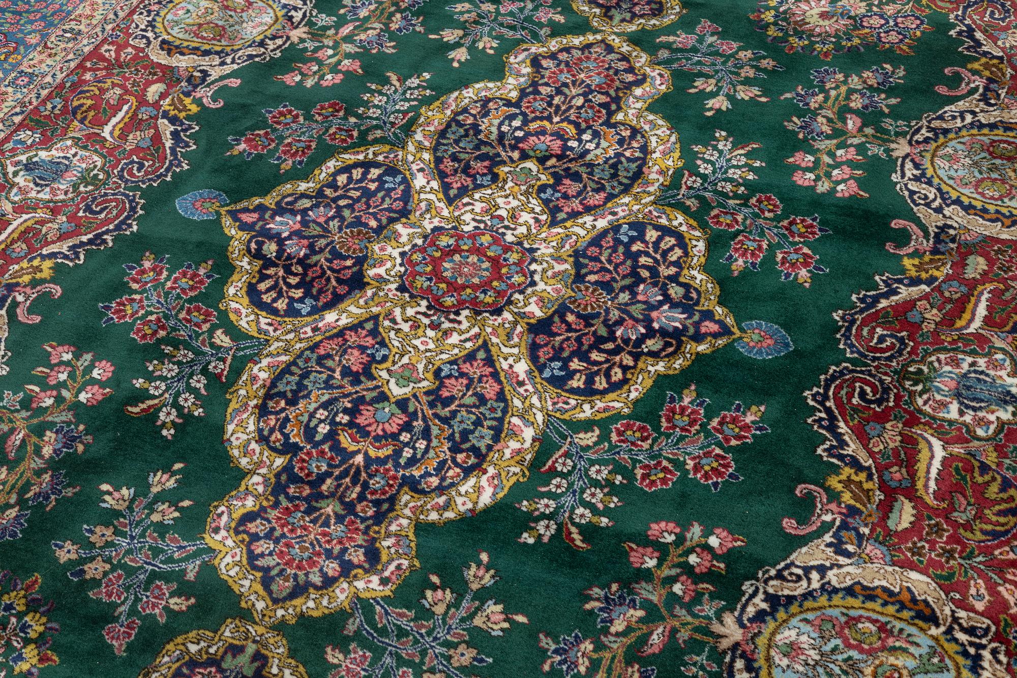 A semi-antique/old carpet, presumably Tabriz, x. 363 x 272 cm.