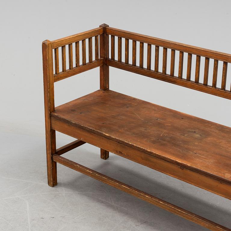 a wooden sofa from around 1900.