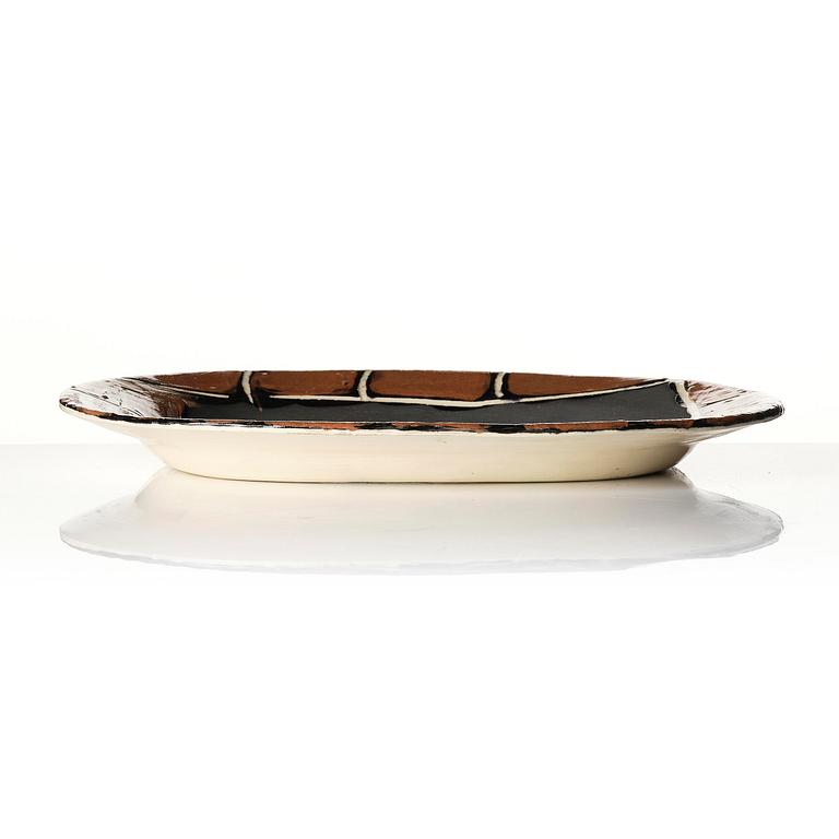 Pablo Picasso, a "Colombe mate" (A.R. 77) faience dish, Madoura, Vallauris, France, post 1948.