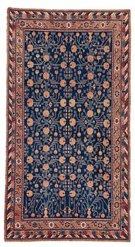 254. A carpet, a semi-antique Khotan, Xinjiang, China, ca 287-290,5 x 154-156 cm.