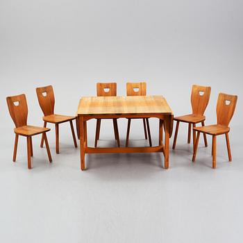 Carl Malmsten, a pine dining table and 6 chairs.