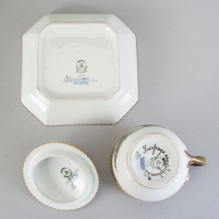 A set of seven Royal Copenhagen 'Flora Danica' custard cups with stands, 20th Century.