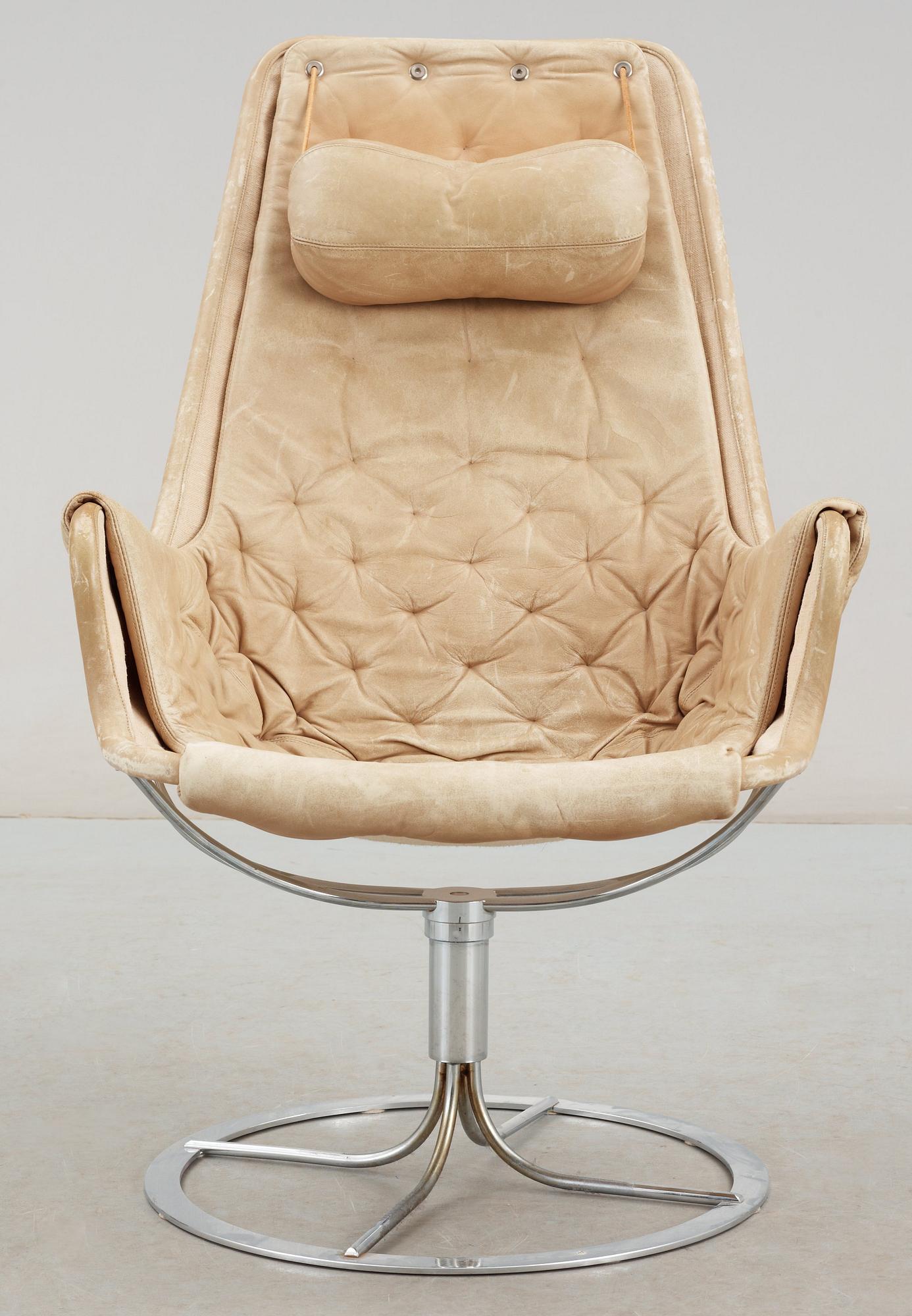 A Bruno Mathsson beige leather and chromed steel 'Jetson' easy chair, DUX.