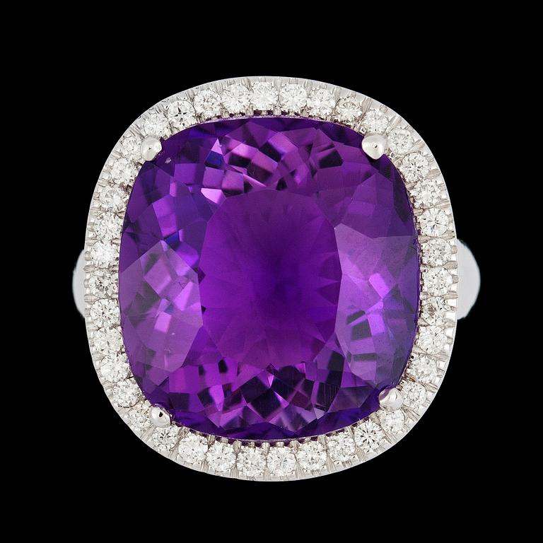 An amethyst, 17.60 cts, and brilliant cut diamond ring, tot. 1.19 cts.