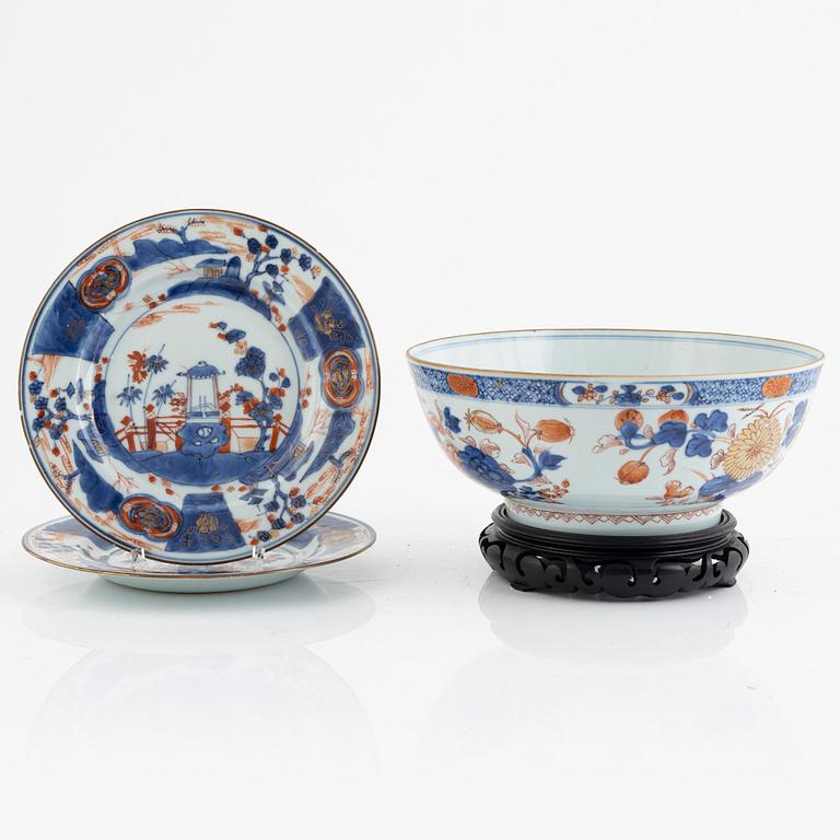 An Imari porcelain bowl and a pair of plates, Qing dynasty, China, 18th century.