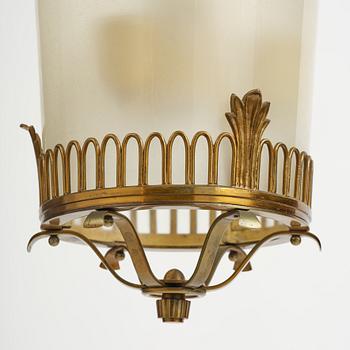 Swedish Grace, a brass and glass lamp, 1920s-40s.