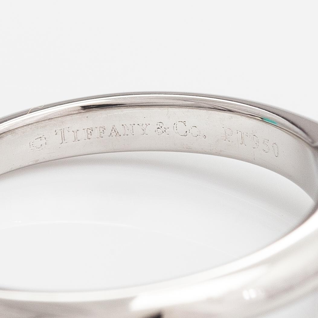Tiffany & Co, A platinum ring with a ca. 0.55 ct diamond.