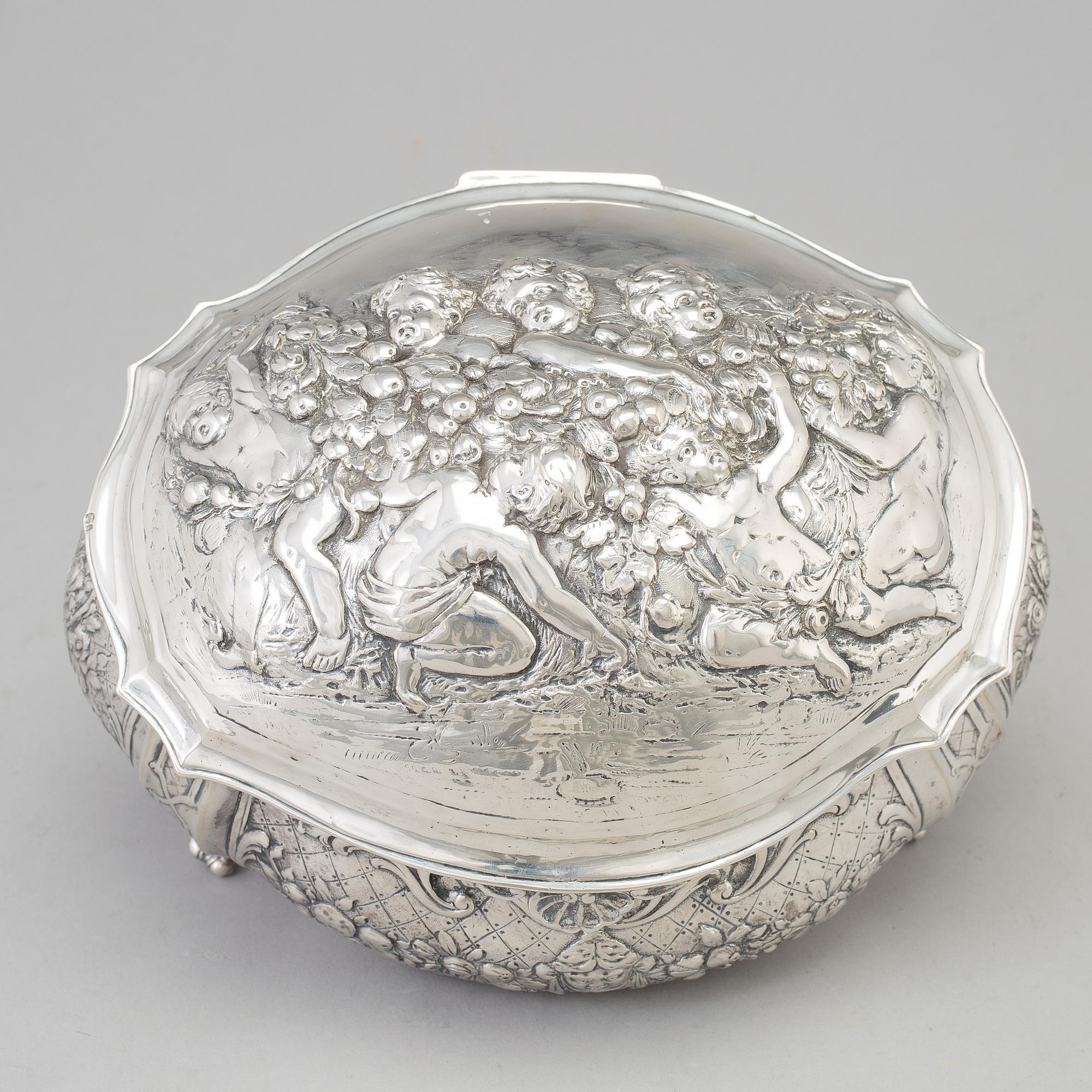 A silver sugar box, early 20th century.