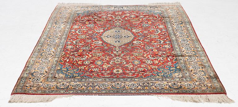 A silk Kashmir rug, c. 176 x 121 cm.