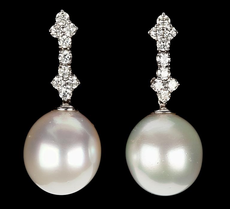 A pair of cultured South sea pearl and diamond earrings.