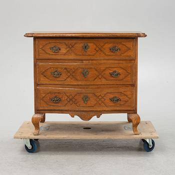 A late Baroque chest of drawers, 18th Century.