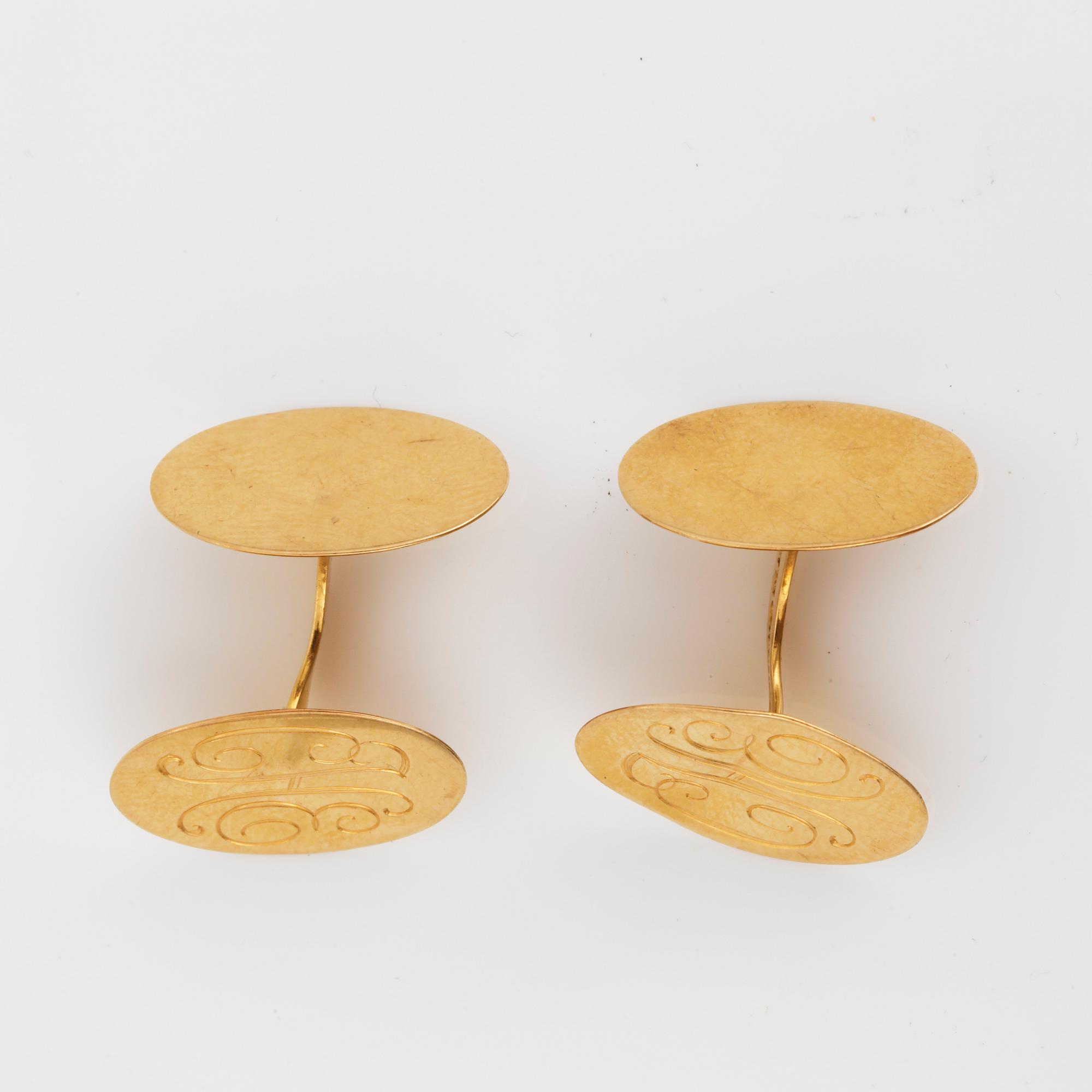 MANSCHETTKNAPPAR, ett par, guld 18k, Gustaf Dahlgren & Co, Malmö 1936. Tot ca 4 gram.