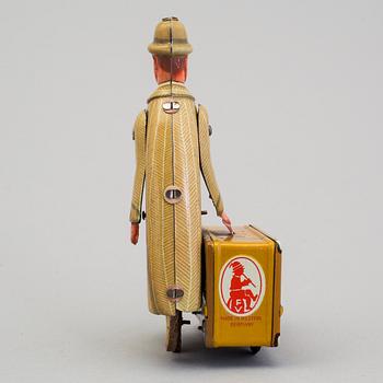 A tinplate Fritz Voith man with suitcase, Germany, 1950s.