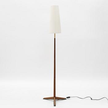 A 1960s teak floor lamp.