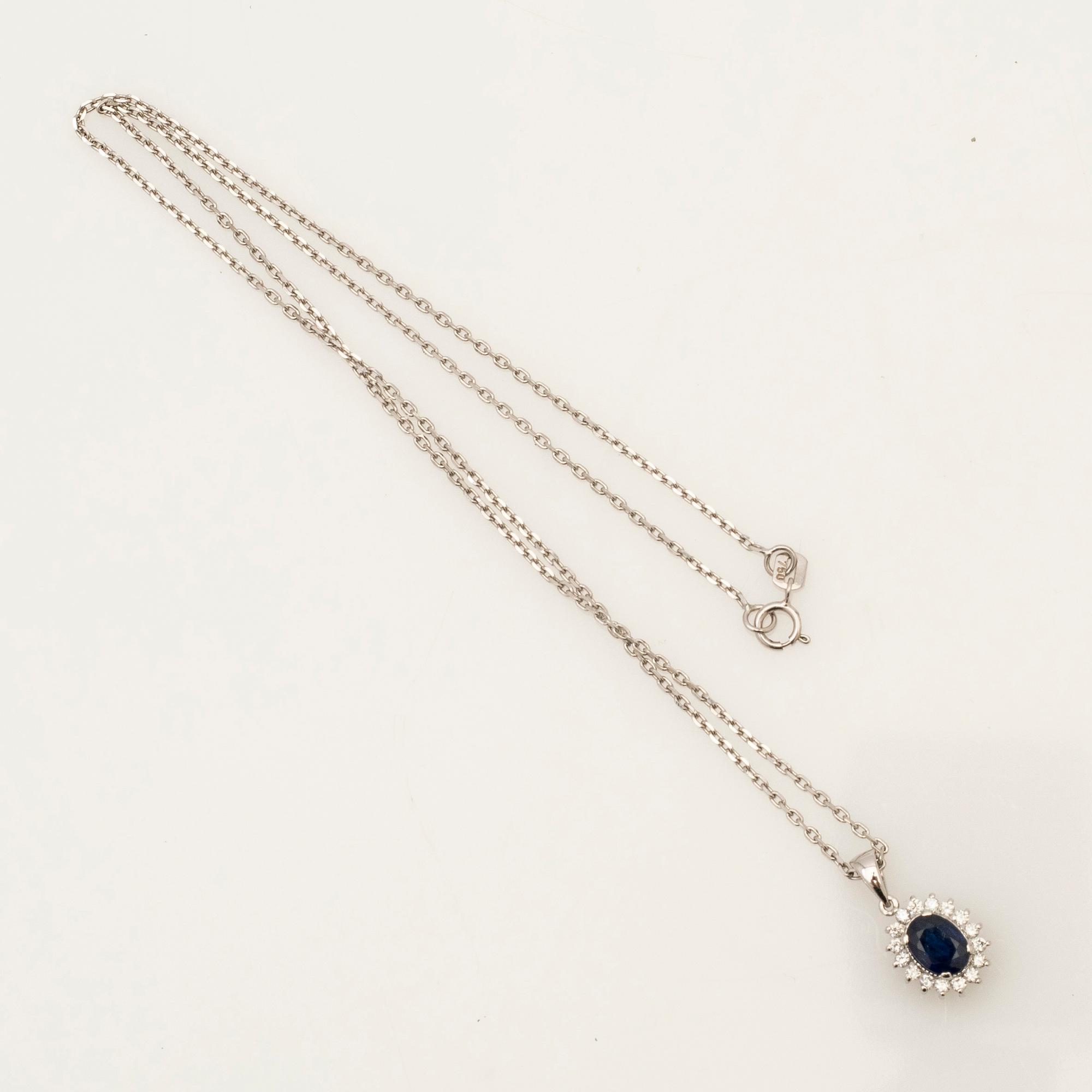 Necklace, 18K white gold with diamonds and sapphire.
