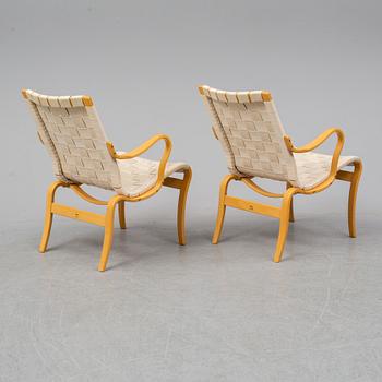 An end of the 20th Century pair of 'Mina' easy chairs  by Bruno Mathsson for Mathssson International.