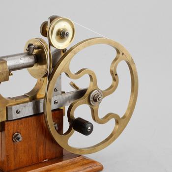 A hand powered lathe for watchmakers by R Flume in Berlin, 19th century.