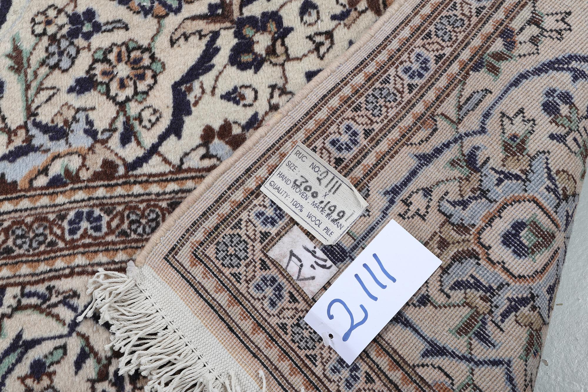 A carpet, Kashan, ca 300 x 199 cm.