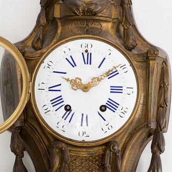 A LOUIS XVI STYLE WALL CLOCK, late 1800s/ early 1900s.