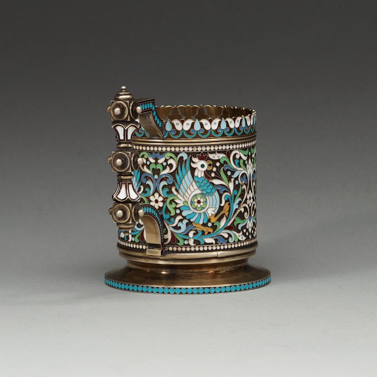 A Russian silver-gilt and enamel tea-glass holder, makers mark of Chlebnikov, Moscow 1892. Imperial Warrant.