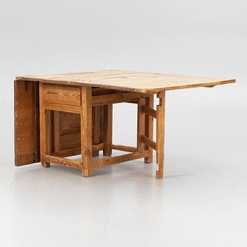 A 19th century gate-leg table.