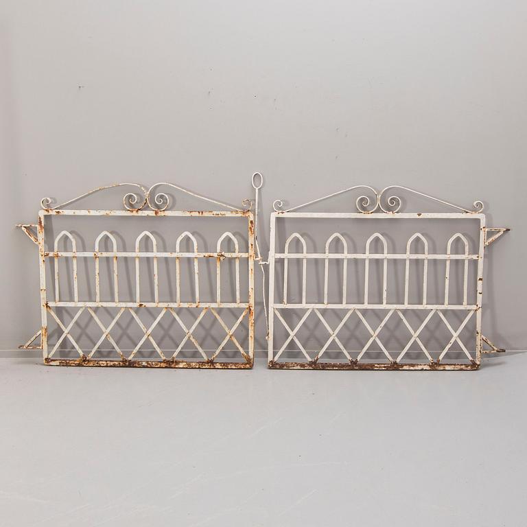 A pair of painted wrought iron gates around 1900.