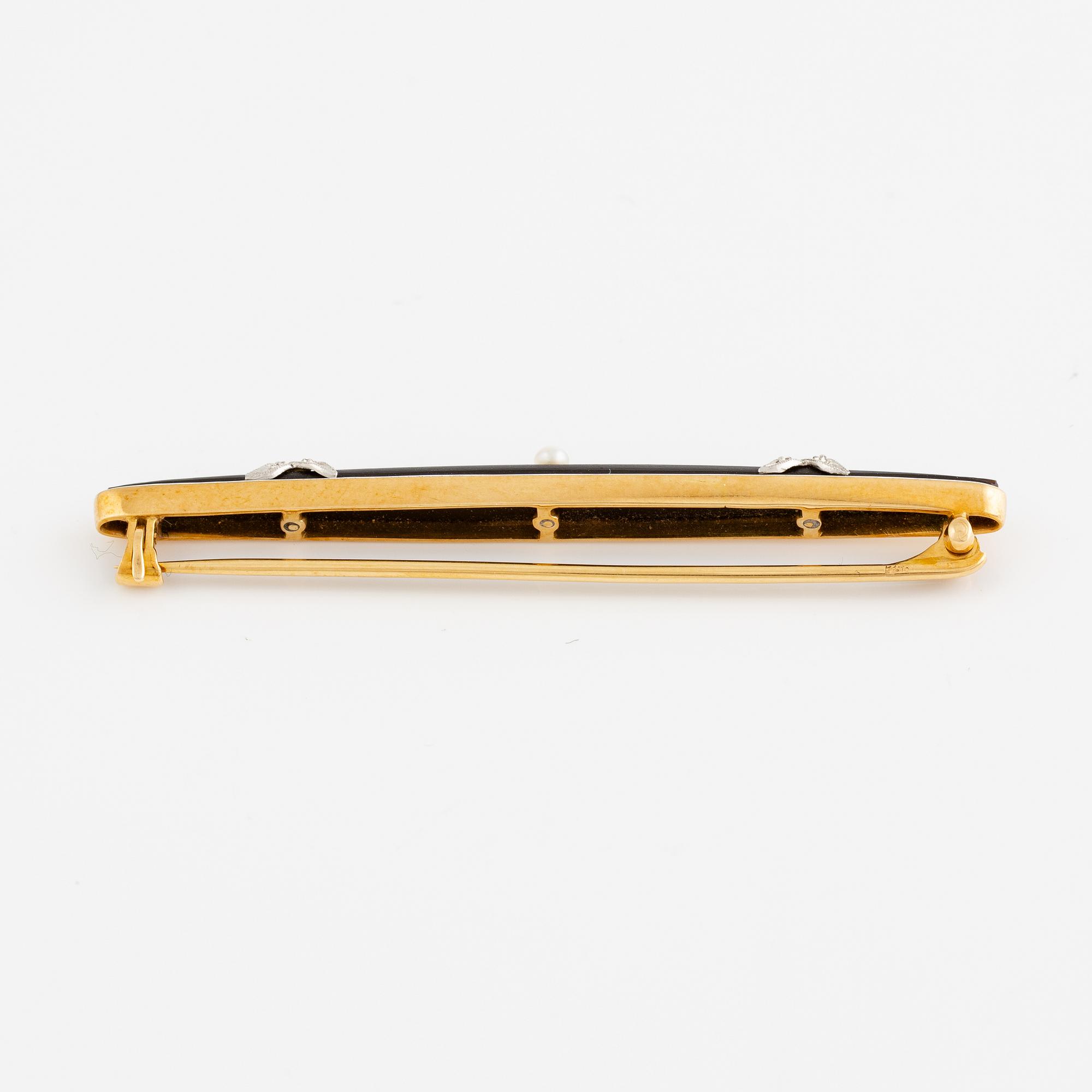 Brooch 18K gold with enamel and a black stone with cultured pearls and rose-cut white stones, including one diamond.