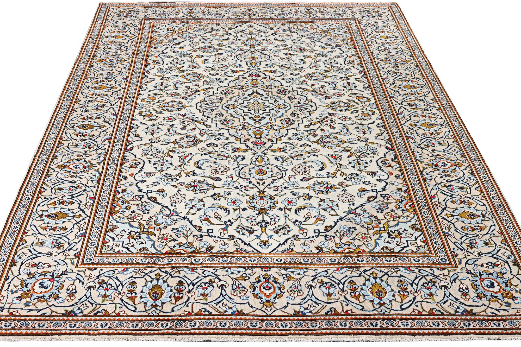 A Kashan carpet, c. 355 x 238 cm.