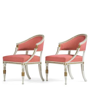 57. A pair of late Gustavian open armchairs attributed to E. Ståhl (master in Stockholm 1794-1820).