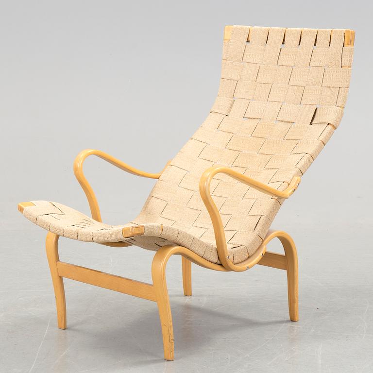 A BRUNO MATHSSON "PERNILLA 2, T. 107" BEECH AND WEBBING ARMCHAIR, Firma Karl Mathsson, Värnamo, Sweden, 1981.