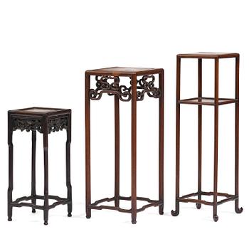 1012. A group of three hardwood tall tables, Qing dynasty.