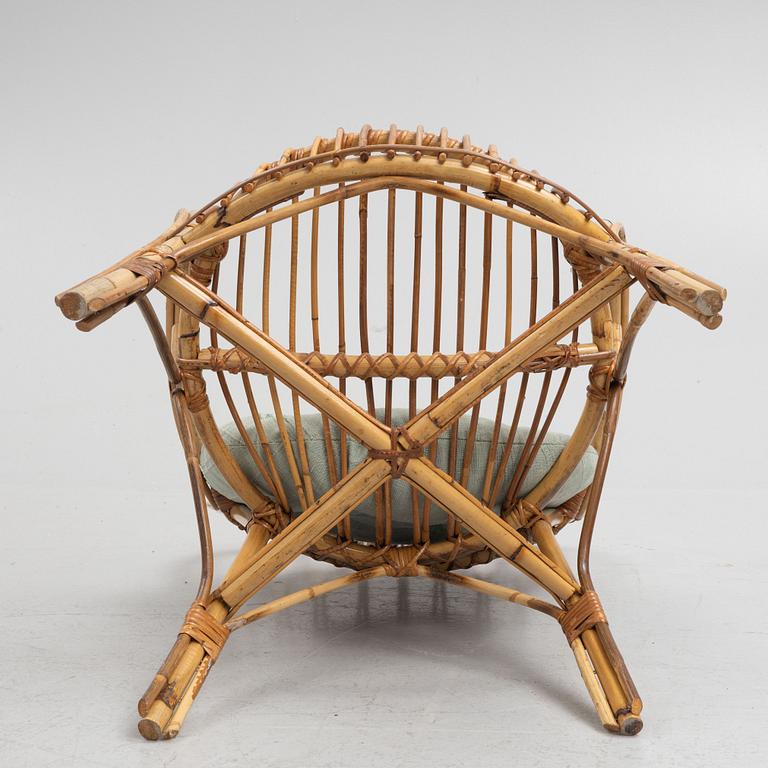 A wicker chair, mid 20th century.