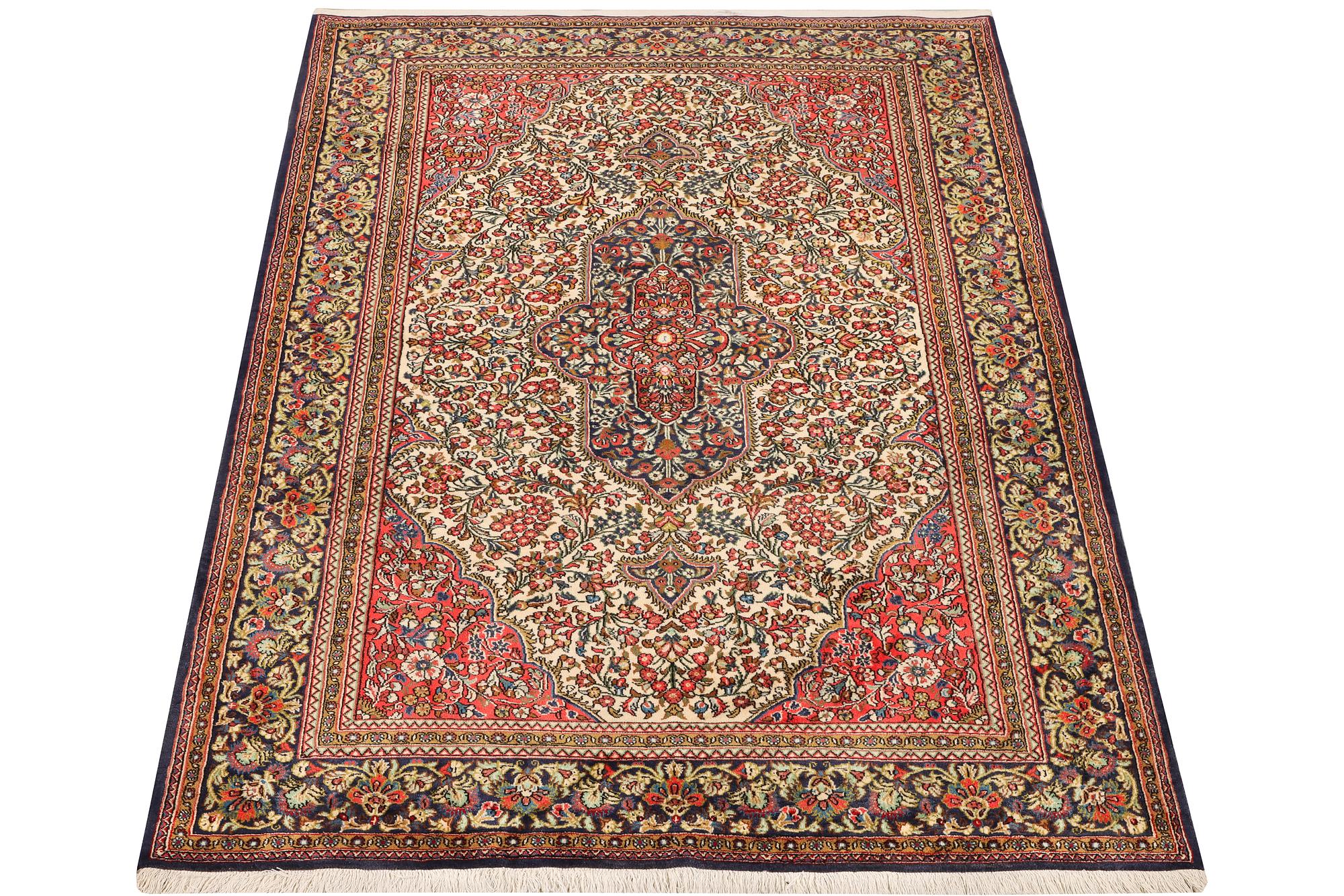A Ghom rug, c. 202 x 137 cm.