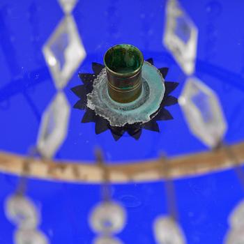 A late-Gustavian five-light gilt brass and cut glass chandelier, Stockholm, late 18th century.