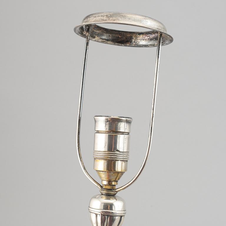 A silver plate neo-rococo tablelamp by CG Hallberg.