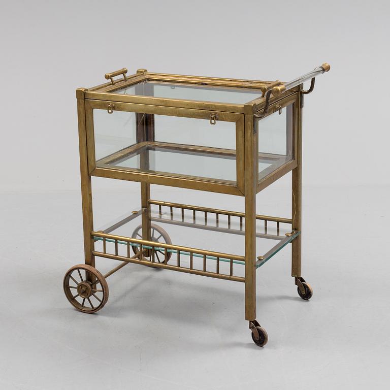 A early brass serving trolley.