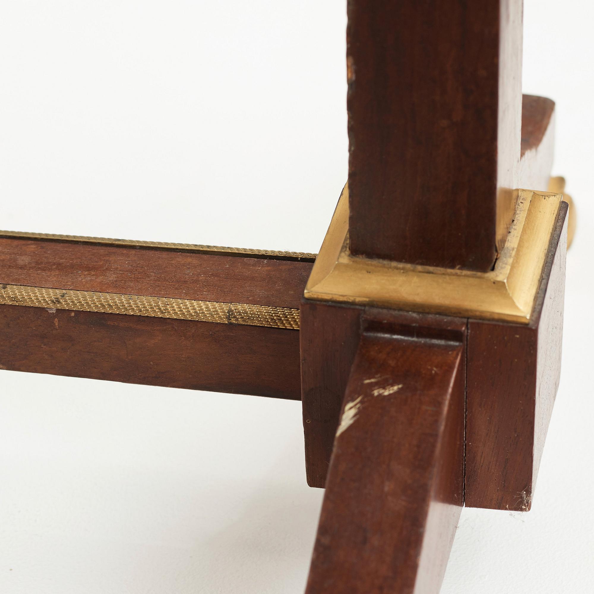 A French Empire early 19th century sewing stand.
