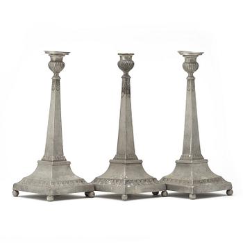 A sert of three late Gustavian pewter candlesticks by M Artedius 1800.